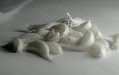 Healthy garlic on a white background. Garlic spice on white.