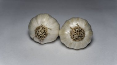 Healthy garlic on a white background. Garlic spice on white.