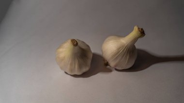 Healthy garlic on a white background. Garlic spice on white.