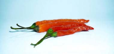 Red chili peppers. Some red red chili isolate on white.