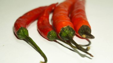 Red chili peppers. Some red red chili isolate on white.