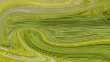 Soyut yeşil ve sarı mermer desenli sıvı desenli animasyon arkaplanı.