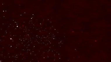 Abstract background of sparkling particles animated on a dark reddish-brown backdrop.