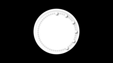 Zaman ilerledikçe siyah bir duvardaki sessiz saat ilerler. Her anın ne kadar çabuk geçtiğinin sakin ama güçlü bir hatırlatıcısı..