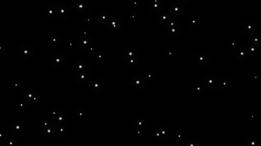 Siyah zemin üzerine parlayan beyaz kar tanecikleri kış tatili ve mevsimsel görsel efektler için mükemmel. Kışın, arka planda parlayan beyaz parçacıklar ile kar fırtınası animasyonu.