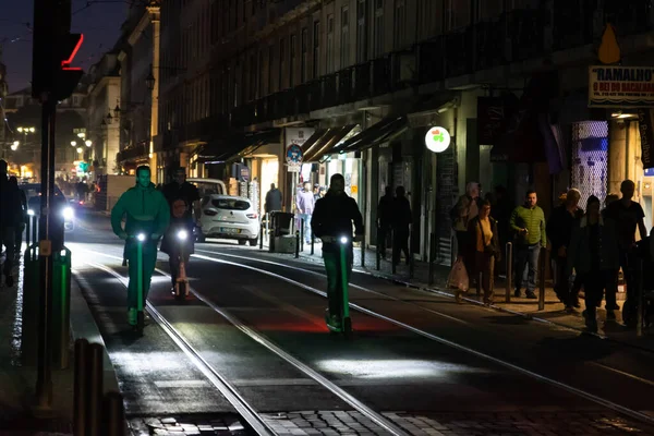 2022 Lisbon Portugal Men Ride Scooters Lisbon Night Mid Shot — Stock Photo, Image