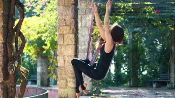 Adult Woman Doing Aerial Yoga Exercises Using Yoga Hammock Mid — Vídeos de Stock