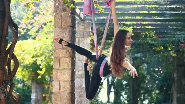 Woman Engaged Aerial Yoga Hanging Hammock Taking Static Poses Mid — Video Stock