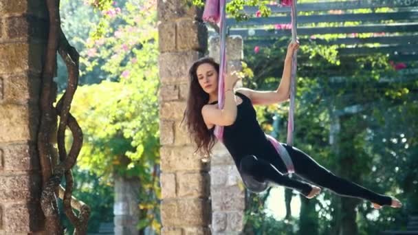 Woman Engaged Aerial Yoga Mid Shot — Wideo stockowe