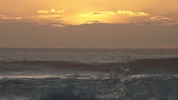 Waves Blue Sea Yellow Sunset Mid Shot — Stockvideo