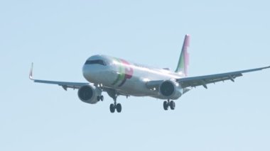 2 December 2022 PORTUGAL, LISBON: AIRPORTUGAL airplane flying in the skies preparing to land. Mid shot