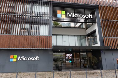 PORTUGAL, LISBON 12 december 2022: Three-story Microsoft Office. Mid shot