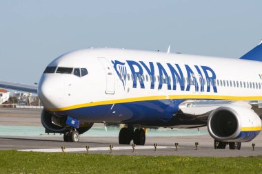 1 December 2022 PORTUGAL, LISBON: big RYANAIR passenger plane on the field. Mid shot