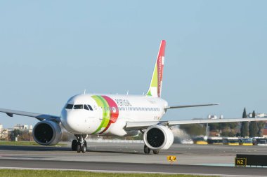 1 December 2022 PORTUGAL, LISBON: AIRPORTUGAL airplane is going to hit the runway. Mid shot