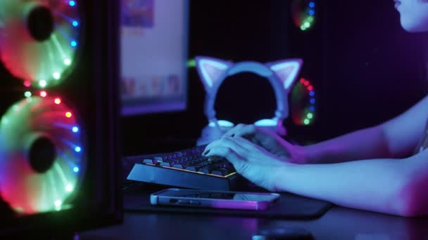 Cute Gamer Girl Sitting Illuminated Neon Lights Mid Shot — Stok video
