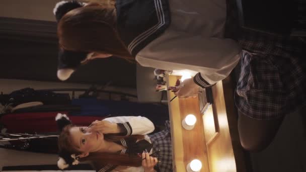 Cute Girl Doing Makeup Front Mirror Backstage Vertical Shot — Stock Video
