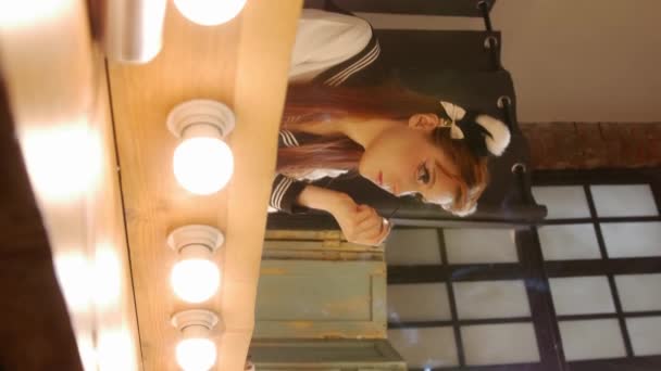 Cute Girl Doing Makeup Applying Mascara Her Eyelashes Looking Mirror — Vídeo de stock