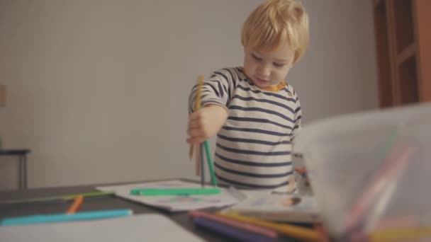 Cute Smiling Little Blonde Boy Playing Color Pencils Mid Shot — Stock videók
