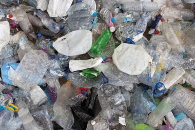 Landfill full of plastic garbage - the problem of environmental pollution. Mid shot