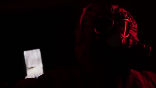 Man Protective Suit Gas Mask Red Lighting Biohazard Portrait — Stock Video
