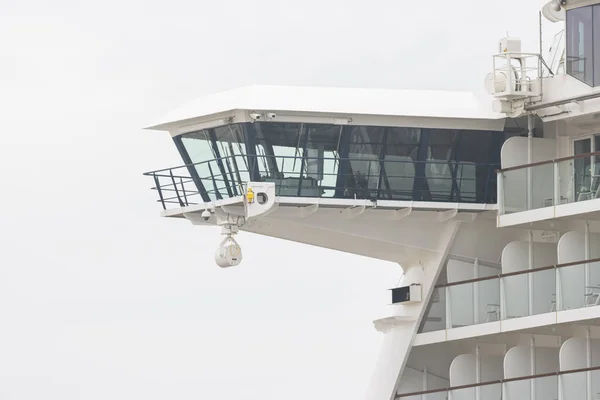 The captains bridge of a large cruise ship. Mid shot