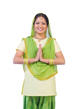 Sikh lady in welcome pose  clipart