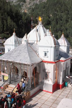 Worshipper Ganga temple Gangotri Uttarakhand India clipart
