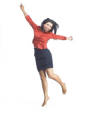 Güney Asyalı yönetici kadın sevinçten zıplıyor  