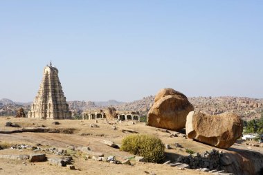 View from Hemkuta hill , gopuram of Virupaksha Temple , Hampi , UNESCO World Heritage site , Deccan plateau , Taluka Hospet , District Bellary , Karnataka , India clipart