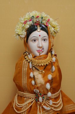 Goddess Gauri brought and worshiped during Ganesh Ganpati festival , Thane , Maharashtra , India clipart