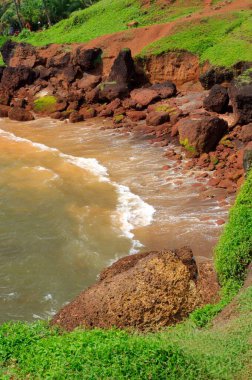 Waves gushing anjuna beach Goa Maharashtra India Asia  clipart