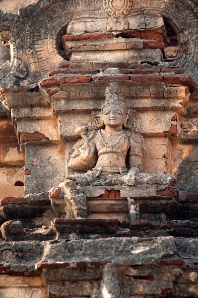 Sculpture of god and goddesses on the peak of krishna temple , Hampi , Karnataka , India