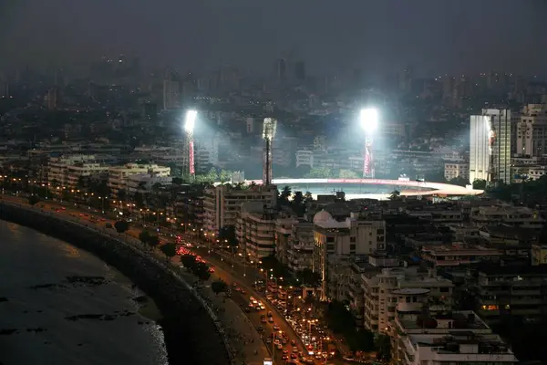 An aerial view of the Marine Drive and Wankhede stadium at night , Bombay now Mumbai , Maharashtra , India