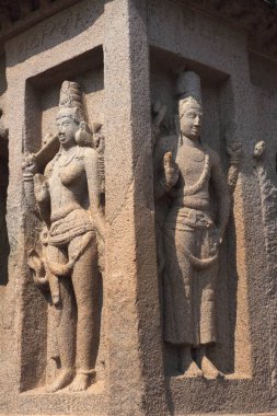 On left Ardhanariswara God Shiva on right God Harihara in monolith rock carving temples , Mahabalipuram , District Chengalpattu , Tamil Nadu , India UNESCO World Heritage clipart