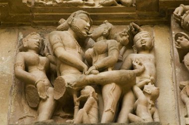 Erotic sculpture of loving couple penis in woman , Khandariya Mahadev temple at Khajuraho , Madhya Pradesh , India