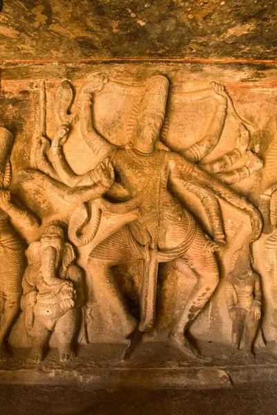 stock image Exuberant dancing Shiva relief in Bas relief in Ravanaphadi cave temple in Aihole , Karnataka , India