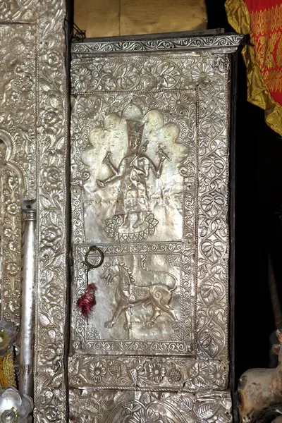 stock image Silver embossed designs of shrine at vaishnavite hindu temple, Kamalabari, Majuli Island, Assam, India 