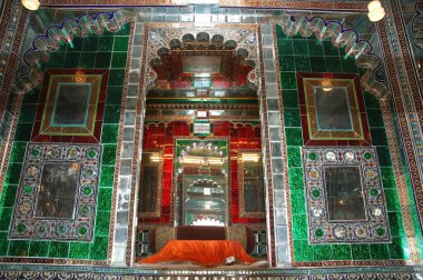 Bhusan Khana, dinning place of Maharana, room clad with shining colored mirror and glasswork, Udaipur, Rajasthan, India  clipart