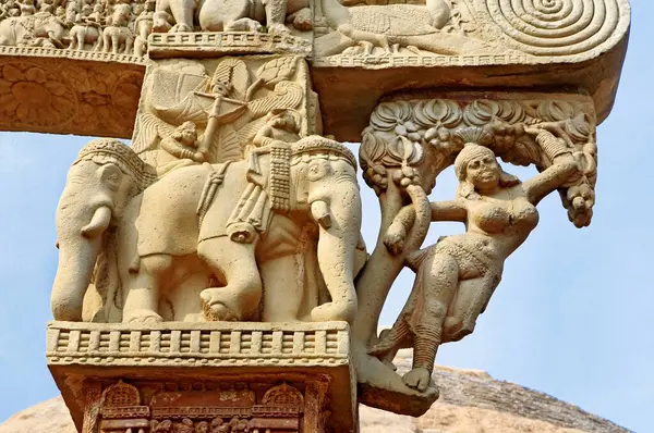 stock image Details of north pillar of eastern gateway showing elephants and yakshi maiden hanging out from one of architraves stupa No 1, Sanchi near Bhopal, Madhya Pradesh, India.