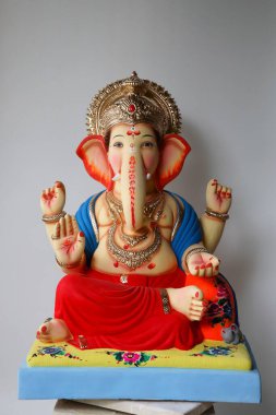 Lord model first idol used by Lokmanya Bal Gangadhar Tilak elephant head god made from mud clay and jute for Ganesh festival, Penn, Maharashtra, India  clipart