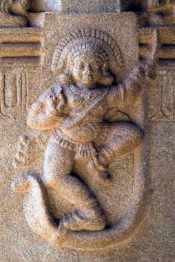 Kaliya Mardana Krishna heykeli Hampi, Karnataka, Hindistan 'daki Ramachandra tapınağının dış duvarında. 