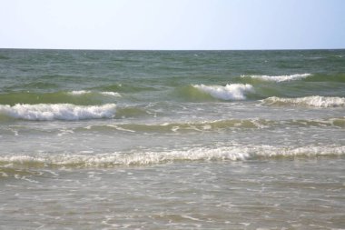 Waves and foam on seashore at Shiroda, Dist Sindhudurga, Maharashtra, India  clipart