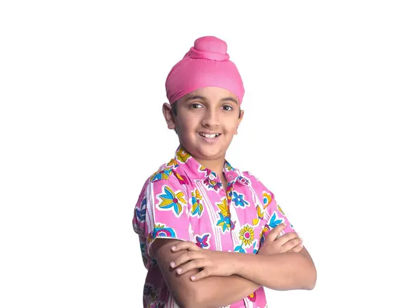 stock image Sikh boy standing with crossed hands isolated over white background 