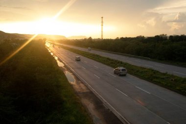 highway of Mumbai Pune road at sunset , Maharashtra , India clipart