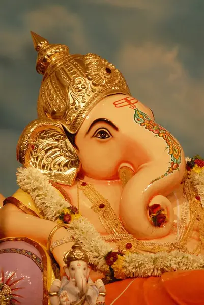 stock image Close up of side view of Idol of Lord Ganesh elephant Headed worshiping for Ganapati Festival at Mandai , Pune , Maharashtra , India , Asia