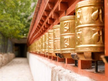 Prayer wheels in alchi monastery , Ladakh , Jammu and Kashmir , India clipart