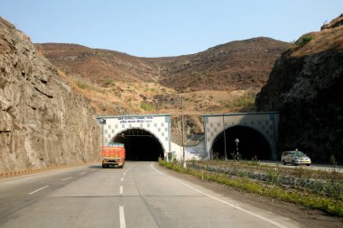 Karjat tunnel on National highway four busiest highways between Mumbai and Chennai in India  clipart