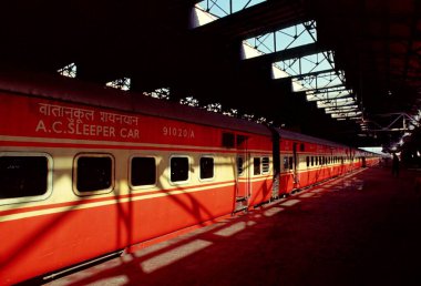 Trains Railways ; rajdhani train on platform ; mumbai bombay ; maharashtra ; india clipart