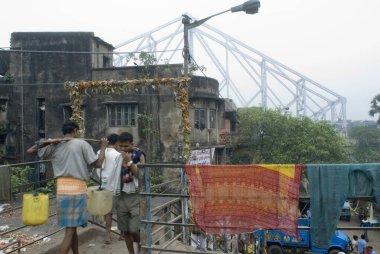 Howrah Bridge (Rabindra Setu)  A miracle of engineering skill  ; Huge cantilever and wide bridge ; Kolkata ; West Bengal ; India clipart