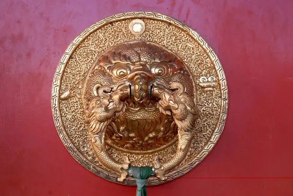 stock image Dragon face door handle at Biggest Namdroling monastery at Kushal nagar District Coorg, Karnataka, India 